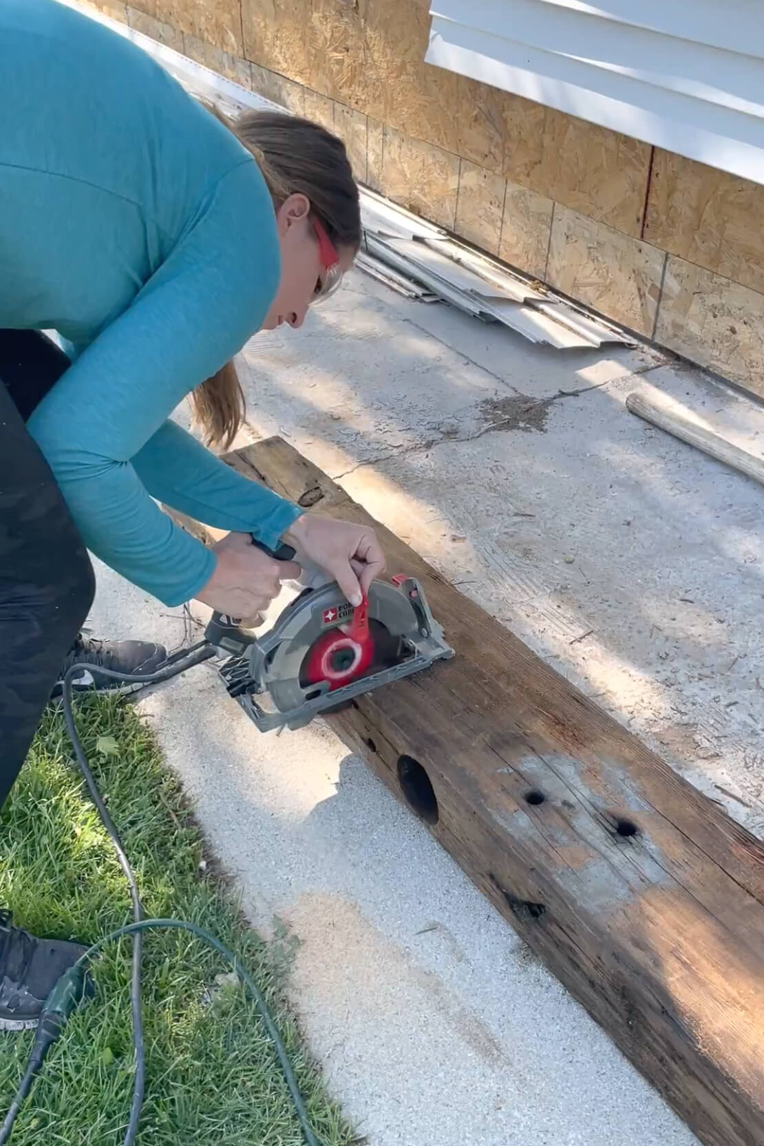 Cutting an old mantle to make it shorter.